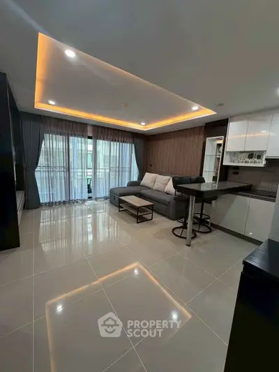 Modern living room with sleek design, open layout, and elegant lighting in a contemporary apartment.