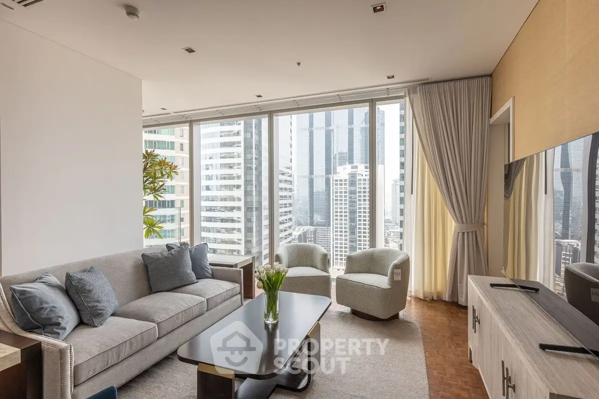 Luxurious living room with stunning city view and modern furnishings