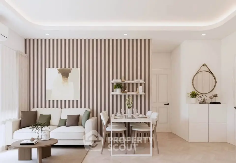 Modern living room with stylish decor and elegant furniture, featuring a cozy sofa and chic dining area.