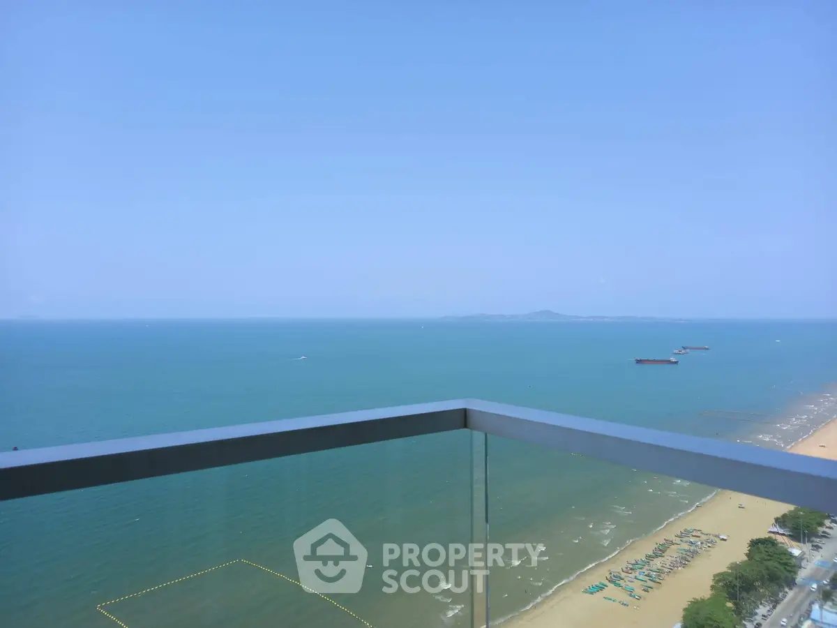 Stunning ocean view from a high-rise balcony, perfect for seaside living.