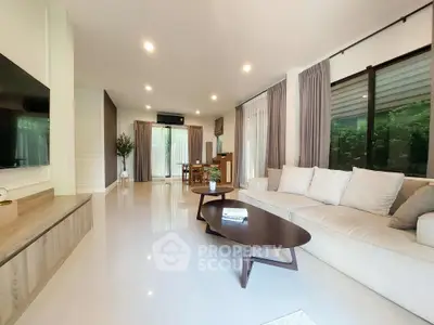 Spacious modern living room with elegant decor and natural light