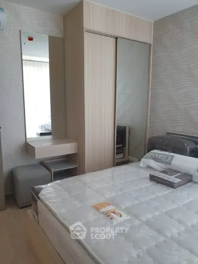 Modern bedroom with stylish decor and ample natural light