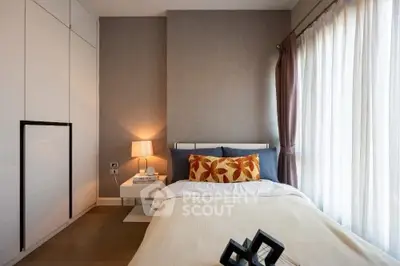 Cozy bedroom with modern decor and natural light