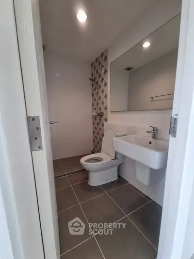Modern bathroom with sleek fixtures and stylish tile design