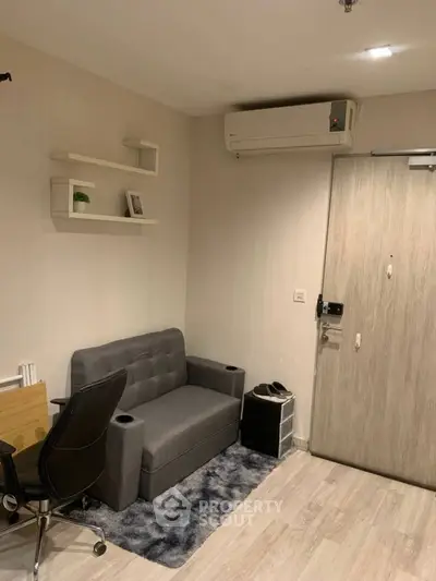 Modern study room with sleek furniture and air conditioning, perfect for productivity and comfort.