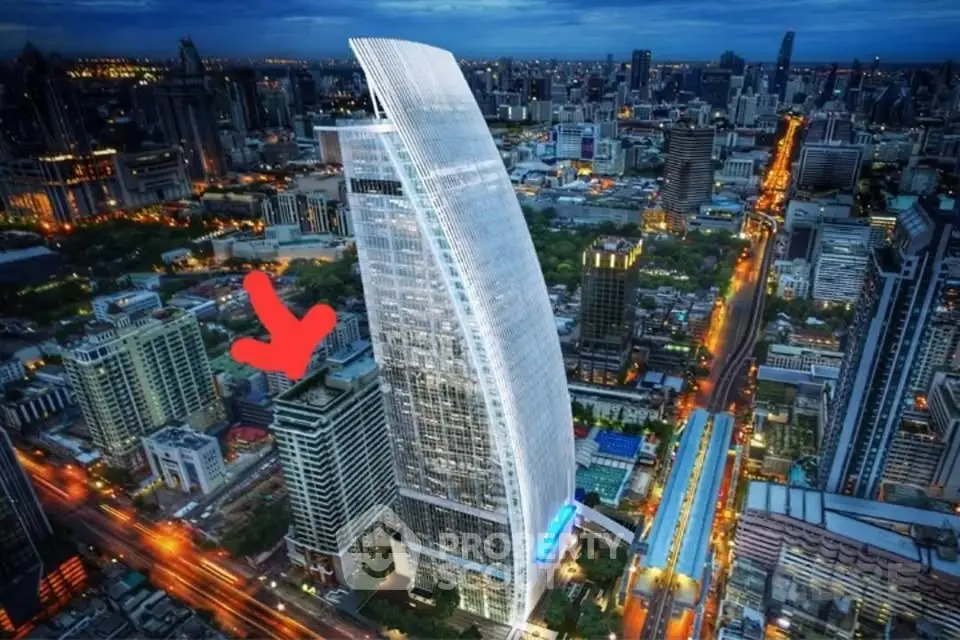 Stunning aerial view of a modern skyscraper in a vibrant cityscape at dusk, showcasing urban architecture.
