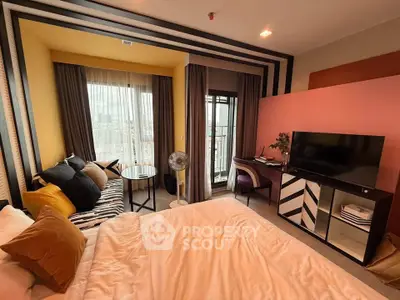 Stylish modern bedroom with balcony access and chic decor