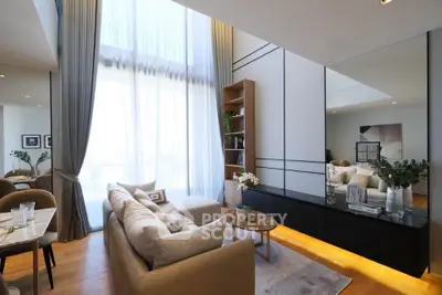 Luxurious modern living room with high ceilings and elegant decor