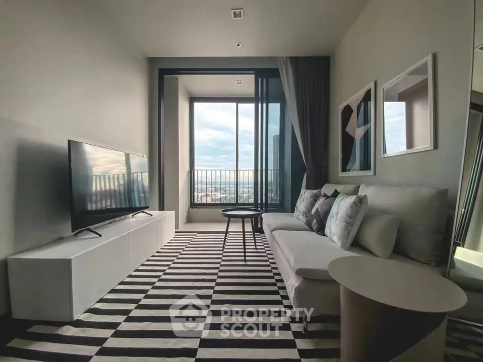 Modern living room with stylish decor and city view from large window.