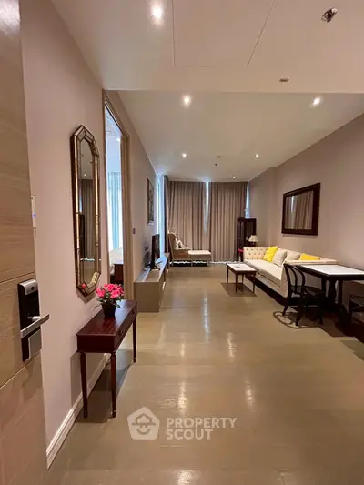 Spacious living room with elegant decor and ample natural light