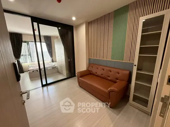 Modern apartment interior with stylish living room and bedroom separation