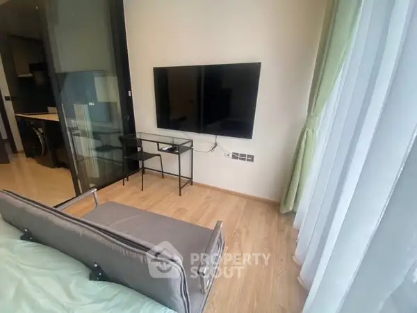 Modern living room with sleek TV setup and stylish decor