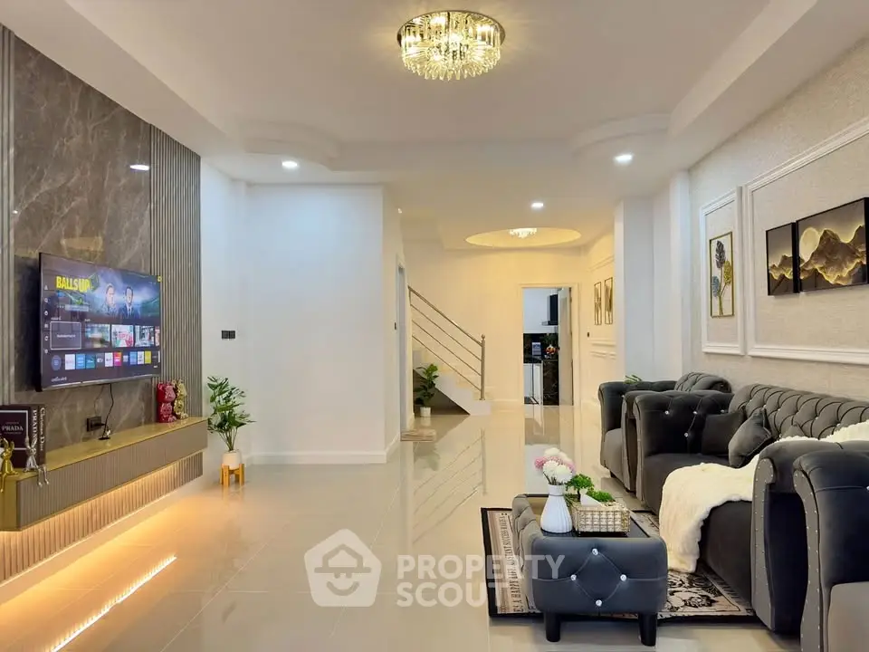 Luxurious living room with elegant decor and modern entertainment setup
