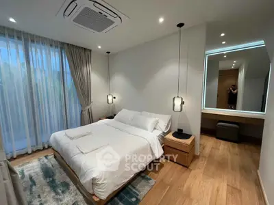 Luxurious modern bedroom with elegant decor and ambient lighting