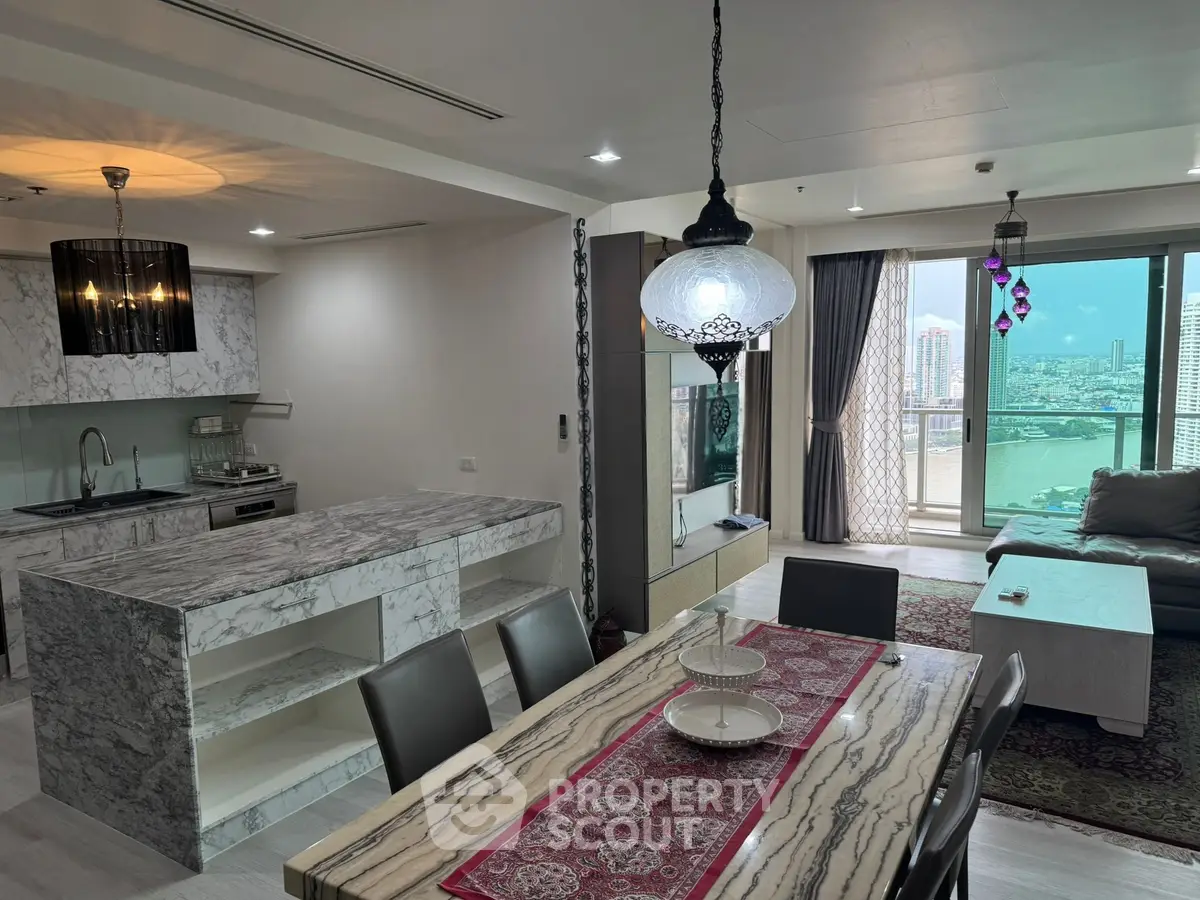 Luxurious open-plan living room with marble kitchen island and stunning city view.