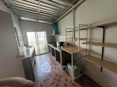 Spacious kitchen with open layout and modern appliances