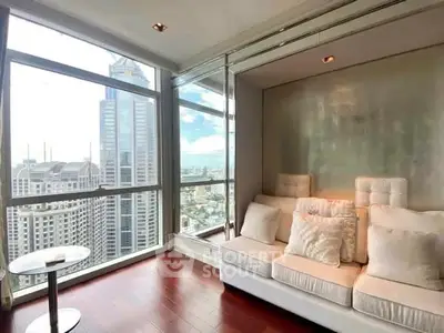 Luxurious high-rise living room with stunning city view and elegant decor