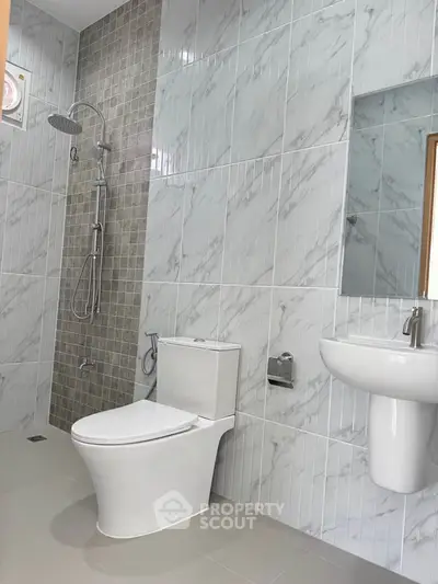 Modern bathroom with sleek fixtures and elegant tile design