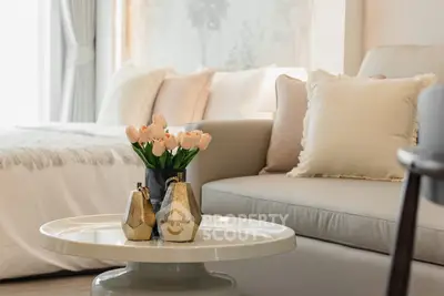 Elegant living room with cozy sofa and stylish decor