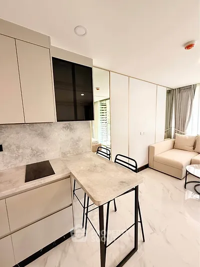 Modern kitchen with sleek design and open layout in a stylish apartment
