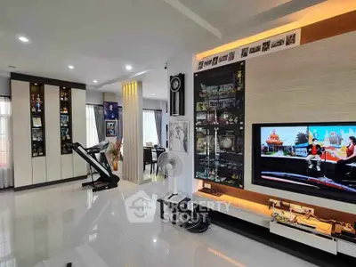 Spacious modern living room with sleek decor and entertainment setup