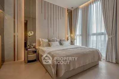 Luxurious bedroom with elegant decor and floor-to-ceiling windows offering stunning views.