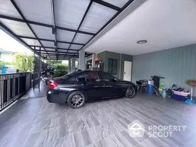 Spacious modern carport with sleek design and ample parking space