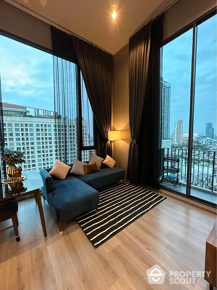 Luxurious high-rise living room with stunning city views and modern decor.