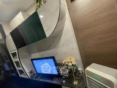 Modern living room with sleek TV setup and stylish decor