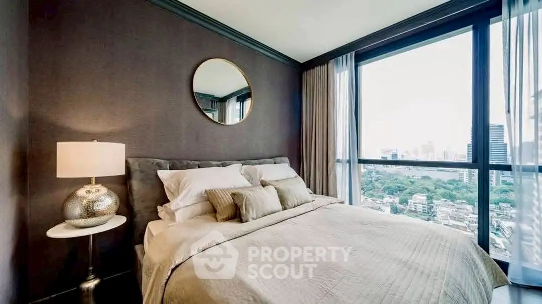 Luxurious bedroom with city view and elegant decor