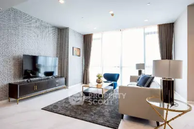 Luxurious modern living room with elegant decor and large windows