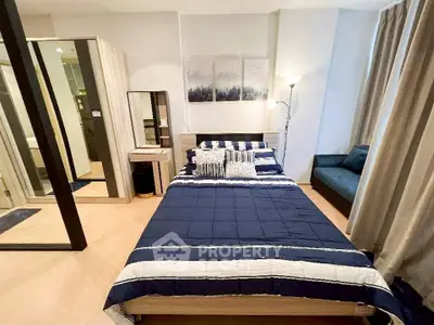 Modern bedroom with stylish decor and cozy ambiance in a contemporary apartment.