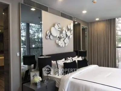 Luxurious modern bedroom with elegant decor and large windows