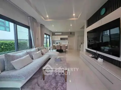 Spacious modern living room with large windows and sleek interior design