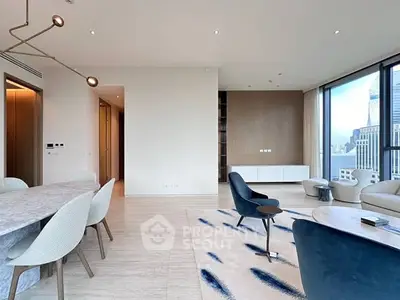 Luxurious modern living room with city view, elegant furniture, and stylish decor in high-rise apartment.