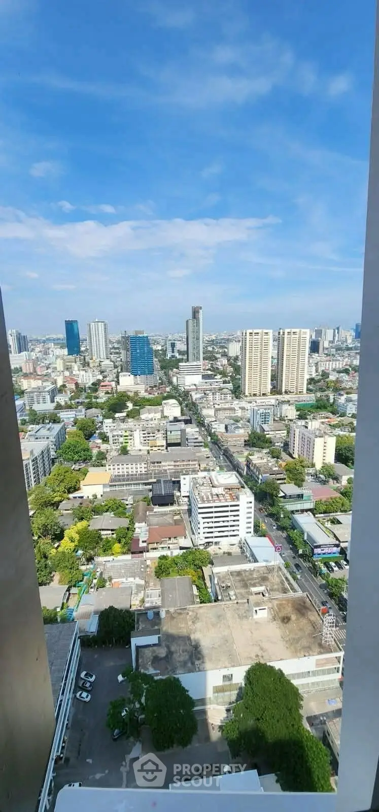 Stunning cityscape view from high-rise building balcony