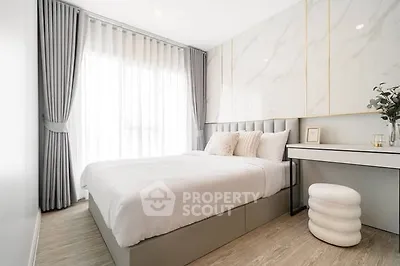 Elegant bedroom with modern decor and natural light