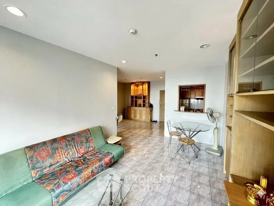 Spacious living room with modern decor and open layout, perfect for entertaining.