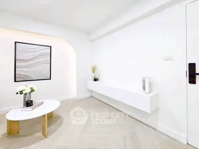 Modern minimalist living room with white decor and stylish coffee table