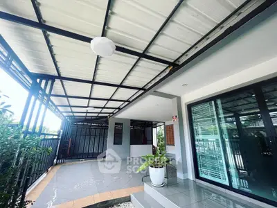Spacious modern patio with sleek design and ample natural light, perfect for outdoor relaxation.