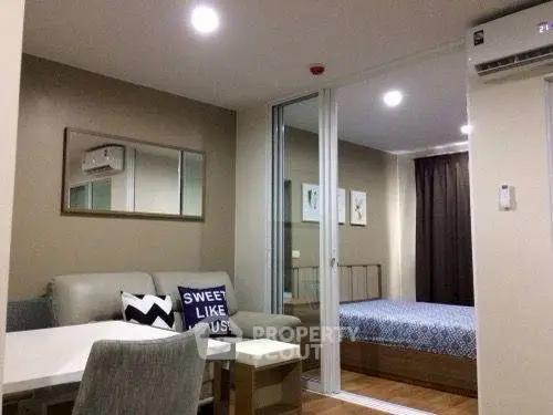 Modern studio apartment with cozy living area and stylish bedroom