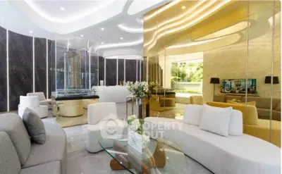Luxurious modern living room with elegant curved sofas and ambient lighting in a high-end real estate property.