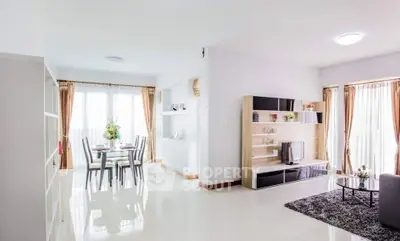 Spacious modern living room with dining area and natural light