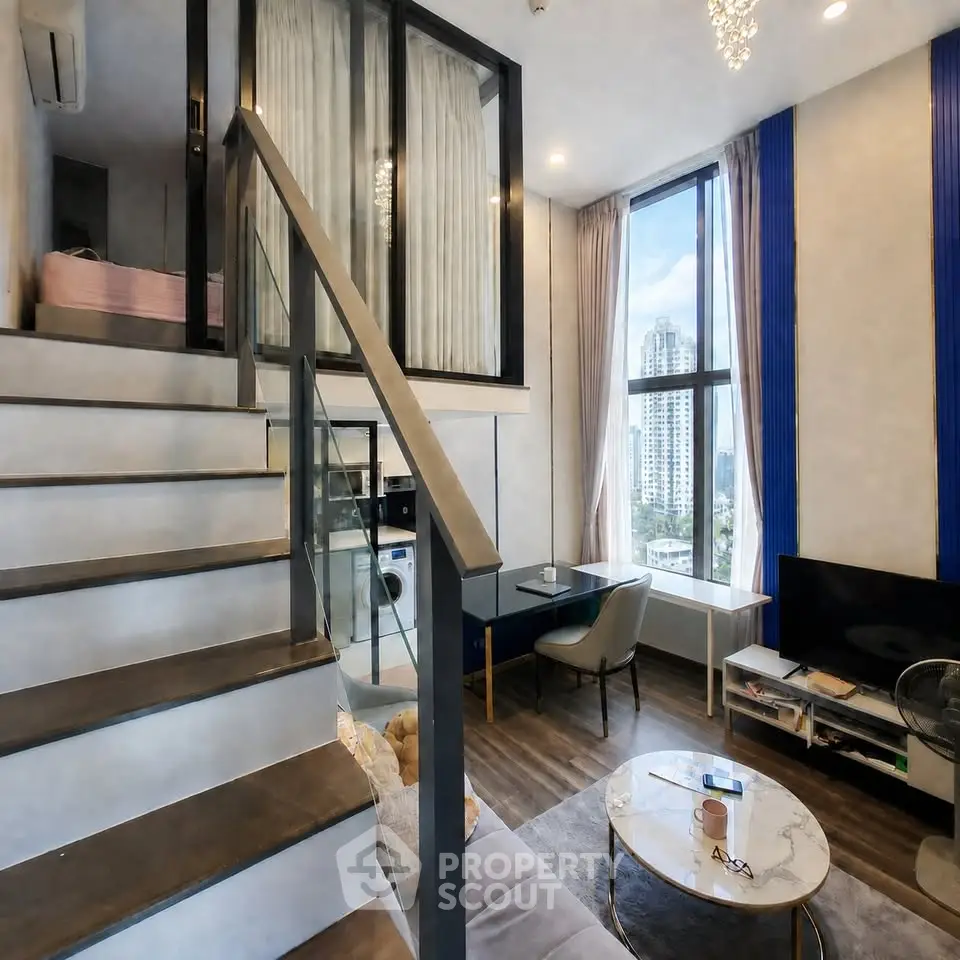 Modern duplex apartment with large windows and stylish interior design