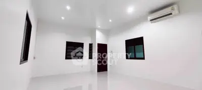 Spacious minimalist room with air conditioning and modern lighting