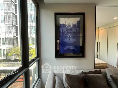 Modern living room with large windows and stylish decor in urban apartment