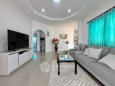 Spacious modern living room with sleek furniture and vibrant decor