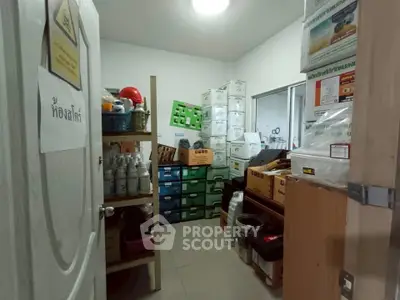 Compact storage room filled with boxes and supplies, ideal for organizing essentials.