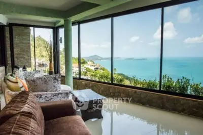 Stunning living room with panoramic ocean view and modern decor