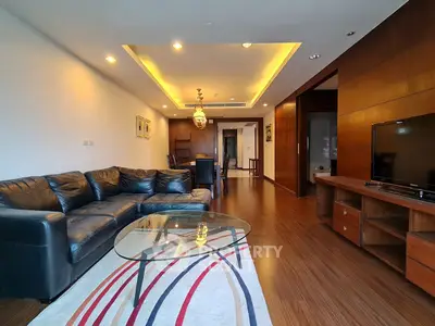Spacious modern living room with leather sofa and stylish decor